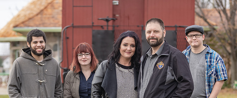 Knights of Columbus family smiling together outdoors